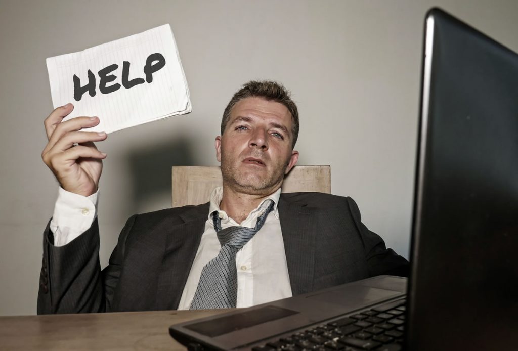 computer-help-business-man-dreamstime_133931348 business man needs computer help